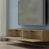 A wall-mounted TV cabinet with its doors open, revealing the interior storage compartments. A large television is mounted on the wall above the cabinet. Produktbild-Vorschau