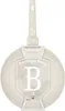 A product shot of a frying pan with its packaging. Voir les images du produit