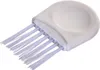 A white epilator cleaning brush with light purple bristles is shown against a white background. Podgląd zdjęcia produktu