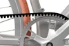 A close-up view of a bicycle's belt drive system, showing the belt, crankset, and part of the rear wheel. Anteprima dell’immagine prodotto