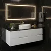 A modern bathroom vanity with a sink and mirror. Produktbild-Vorschau
