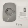 A gray base for a heater, an instruction manual, and three wing nuts are laid out on a white background. Náhled obrázku produktu