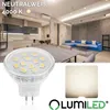A collage showing a living room and kitchen interior, a close-up of an LED bulb, and a swatch of light. Produktbild-Vorschau