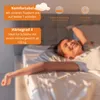 A woman is stretching happily on a bed with a mattress topper. Anteprima dell’immagine prodotto
