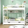 A white bunk bed with drawers and shelves, decorated with children's room items, against a light green wall. Náhľad obrázku produktu