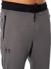 A close-up view of the upper part of a pair of gray sweatpants. Produktbild-Vorschau