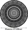 A round black rug with a white mandala pattern is shown from a top-down perspective. A measurement line with text indicating the diameter is visible at the bottom. Produktbild-Vorschau