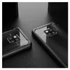 Two black phone cases are displayed on a dark, textured surface with a dark background element. Produktbild-Vorschau