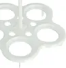 A close-up view of a white plastic egg holder with multiple circular openings and a central stem. Produktbild-Vorschau
