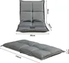 Two views of a gray floor chair with dimensions labeled. Voir les images du produit