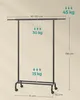 A black clothes rack with dimensions and weight limit information indicated by text and arrows. Náhled obrázku produktu