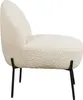 A side view of a beige bouclé armchair. Voir les images du produit