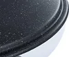A close-up view of the speckled surface of a cooking pan or griddle. Podgląd zdjęcia produktu