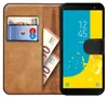 A book-style phone case with a Samsung Galaxy J6 2018 phone inside, showing cards and euro banknotes. Produktbild-Vorschau