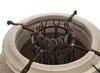 Close-up view of the top opening of a tandoor oven, showing the metal rack and skewers inside. Anteprima dell’immagine prodotto