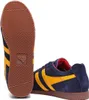 A pair of Gola Harrier sneakers, viewed from the side and underneath. Produktbild-Vorschau
