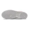 The underside of a white and pink Nike shoe. Produktbild-Vorschau