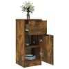 A wooden cabinet with a drawer and a door open, displaying some items inside, with a vase of flowers on top. Produktbild-Vorschau