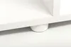 A close-up view of the bottom of a white aquarium cabinet, showing one of its round white feet. Produktbild-Vorschau