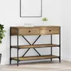 A console table with drawers and shelves against a white wall. Náhľad obrázku produktu