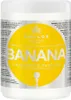 A white tub of Kallos Banana Hair Mask with a large yellow circular label. Podgląd zdjęcia produktu