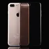 A gold iPhone 8 Plus/7 Plus is shown next to a transparent black phone case on a black background. Produktbild-Vorschau