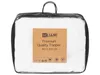 A white mattress topper is shown inside a clear plastic bag with handles. A brown cardboard tag is attached to the front of the bag. Náhled obrázku produktu