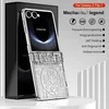A silver phone case for a Samsung Galaxy Z Flip 7 is displayed on a white surface with a black box behind it. Text overlays describe the product's features. Produktbild-Vorschau