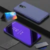 A collection of smartphone cases and accessories displayed on a dark surface.