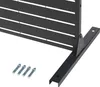 A close-up view of the base and lower section of a black slatted screen, with four silver-colored bolts in the foreground. Voir les images du produit