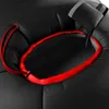 A close-up view of the opening of a black sleeping bag with a red trim and drawstring. Voir les images du produit