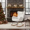A cozy living room scene with a fireplace, Christmas tree, and a rocking chair. Produktbild-Vorschau