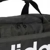 A close-up view of the zipper and fabric of a black duffel bag. Produktbild-Vorschau