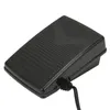 A black electronic sewing machine foot pedal is shown against a white background. Produktbild-Vorschau
