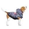 A beagle dog wearing a Marvel-themed hoodie, photographed against a white background. Podgląd zdjęcia produktu