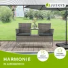 A polyrattan garden bench with a table and cushions is set up on a wooden deck next to a pool, with an umbrella providing shade. Náhled obrázku produktu