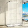 A walk-in shower enclosure with a clear glass panel and a white base, set against a tiled wall and a large window with a mountain and lake view. Produktbild-Vorschau