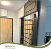 Interior hallway with a wooden door and a sliding door with a grid pattern. Podgląd zdjęcia produktu