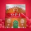A gingerbread house-shaped advent calendar for OPI nail polish, surrounded by red gummy candies. Anteprima dell’immagine prodotto