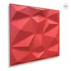 A single red 3D wall panel with a geometric design, shown at an angle against a white background. Produktbild-Vorschau