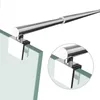 A close-up view of a chrome telescopic rod attached to a glass panel, with a magnified inset showing the attachment detail. Podgląd zdjęcia produktu