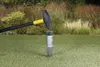 A hammer is being used to drive a ground post into a lawn. Produktbild-Vorschau