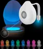 A toilet with a motion-activated LED light that changes colors. Voir les images du produit