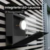 A black mailbox mounted on a wooden slatted wall, with its door open and a key inside. An illuminated circular light is visible inside the mailbox. Anteprima dell’immagine prodotto