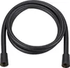 A black shower hose is coiled on a white background. Produktbild-Vorschau