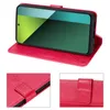 A red flip cover wallet case for a Xiaomi Redmi Note 13 Pro 5G phone, shown open with the phone inside and propped up. Produktbild-Vorschau
