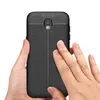 Hands holding a black phone case with a textured back. Produktbild-Vorschau