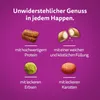A marketing image showing four different types of pet food kibble with descriptive text in German. Náhľad obrázku produktu