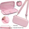 A collage of images showing a pink carrying case for a Nintendo Switch, its interior, and accessories like a hand strap and shoulder strap. Produktbild-Vorschau