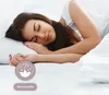 A woman sleeping peacefully in a bed. Produktbild-Vorschau
